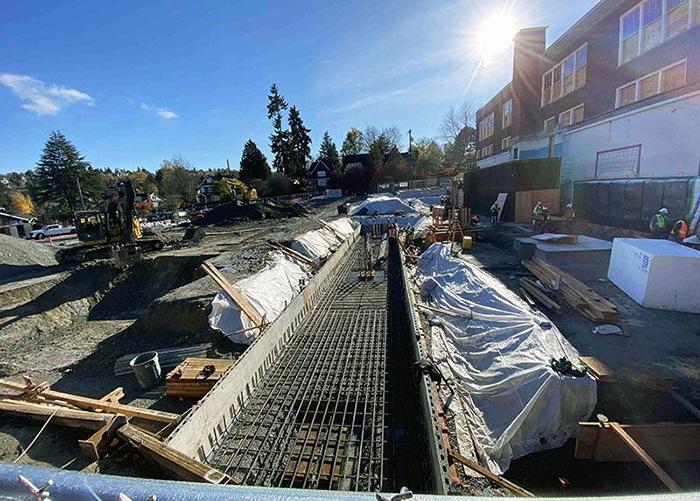 rebar trench next to a brick building